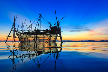 Silhouette of the traditional fishing structure built with bamboo called Bagang, typical of Sabah, Borneo.