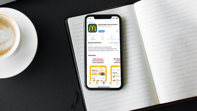 Mobile phone with McDonalds App Store screen