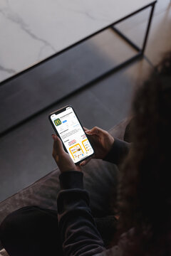 Mobile phone with McDonalds App Store screen