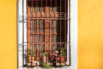 Vintage window of an old Portuguese era house in the Fontainhas district of the city of Panaji.
