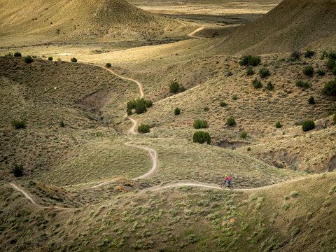 A young boy mountain biking on the 18 Road Trails near Fruita, Colorado