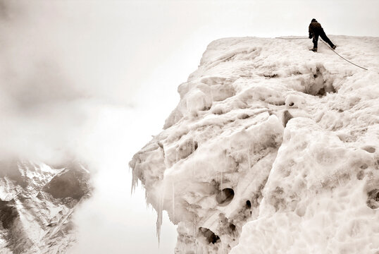 A climber ascends Imja Tse (aka Island Peak) in the Nepal Himalayas