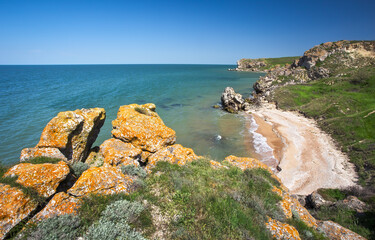 Rocks, beaches and beautiful turquoise sea water. Exotic beach. Tranquility of turquoise sea water. Beautiful landscape. Composition of nature. General's Beaches. Crimea.