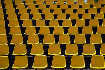 Fototapeta premium yellow chairs in stadium