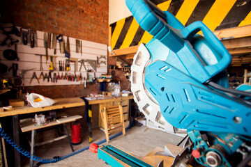 Circular saw in a workshop. Industry concept