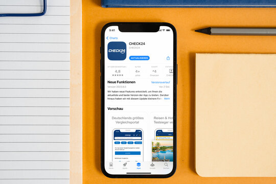 Mobile phone with Check24 App Store screen