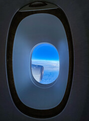 airplane window on sky