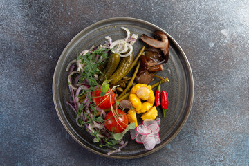Various pickled vegetables in a plate.