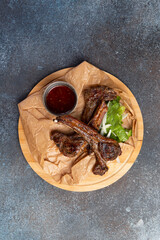 Roasted rack of lamb on the board.