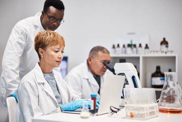 Science, research and woman with laptop in laboratory for experiment, study and medical report....