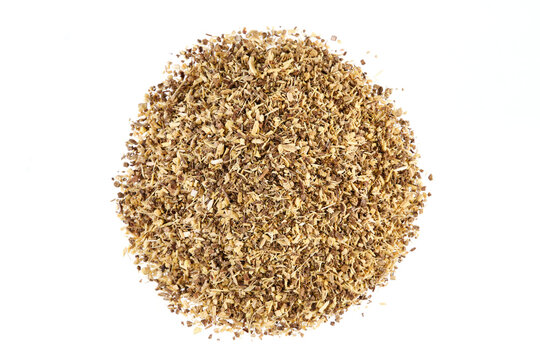 Overhead view of dried licorice root (Glycyrrhiza glabra), isolated on white background