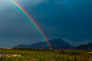 Fototapeta na wymiar Storm, rain and rainbow in Spain, Orihuela