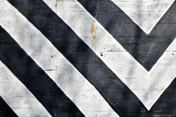 Old wall background. Black and white stripes on old wall. 