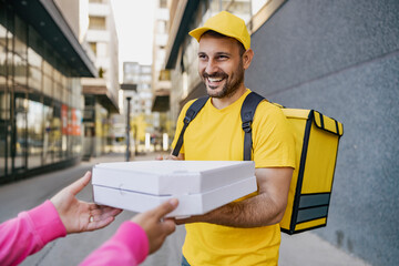 Courier delivering pizza to customers