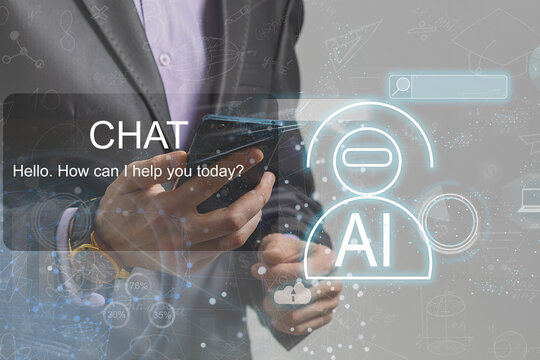 ChatGPT Chat with AI or Artificial Intelligence. Young businessman chatting with a smart AI or artificial intelligence using an artificial intelligence chatbot developed by OpenAI.