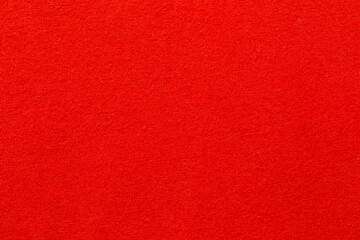 Fototapeta premium The dark red cloth color texture wall as background.