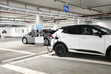 Charging electric station for charging cars in the underground parking. The concept of ecological...