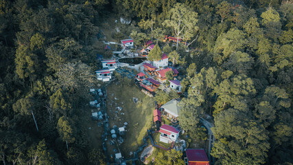Aerial view of the Hill Resort surrounded by the rainforest in Lenggong during sunrise.