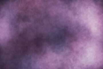 Beautiful of abstract colored dust explosion on black background.  It's red, green, blue, yellow, purple and orange powder is moving in frame. 