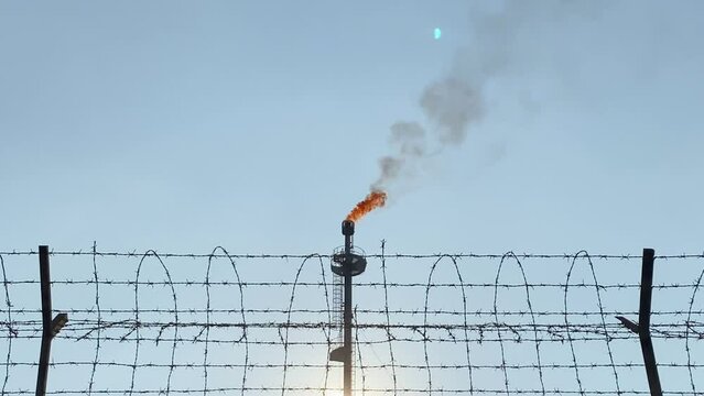 Footage of gas plant burning gases, amidst gas price war due to Ukraine war and Russia's economic situation with EU. Perfect for news and documentary films about geopolitics, energy.