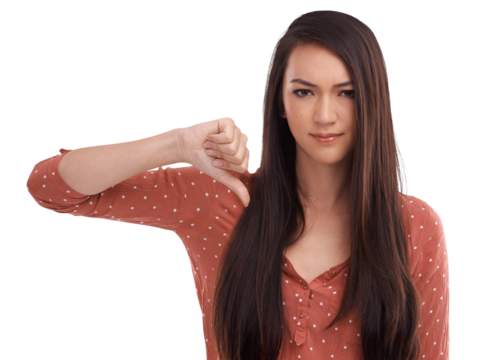 A young beautiful university student model pointing with a thumb down for negative or frowning in frustration, wrong, incorrect or displeased expression isolated on a png background.