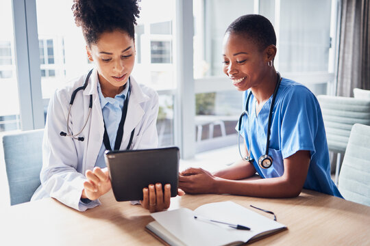 Tablet, black woman or doctors with medical research reading news or tests results in hospital together. Teamwork, digital tech or African nurses planning or speaking of healthcare report on website