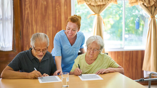 Senior couple solving puzzles as memory training