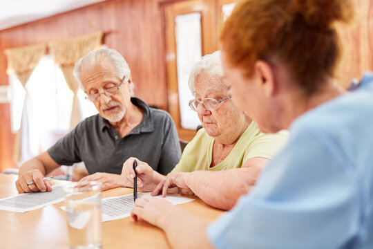 Pair Of Seniors Solving Puzzles As Memory Training