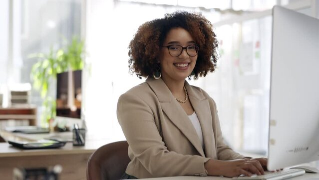 Black woman, office and typing on computer with smile, face and focus for schedule, calendar and planning. Happy executive secretary, portrait and workplace with management, happiness or email on web