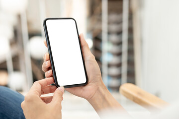 cell phone blank white screen mockup.hand holding texting using mobile on desk at office.background empty space for advertise.work people contact marketing business,technology