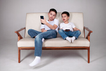 Plakat two boys in white t-shirt and jeans 