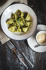 Appetizing Italian food on a dark wooden table. Food photography. Still life