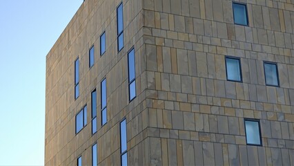 geometric tile facade with windows