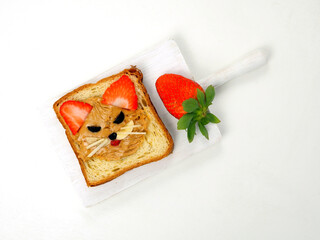 Funny breakfast toast for kids shaped like a cute fox
