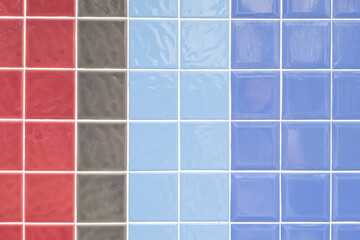Multi-colored ceramic small square tiles lined with vertical stripes