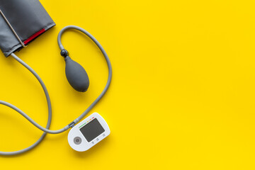 Heart attack risk. Checking blood pressure and heart rate by medical tonometer