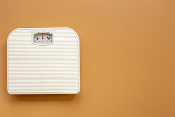 Check your body shape with white weight scales, top view