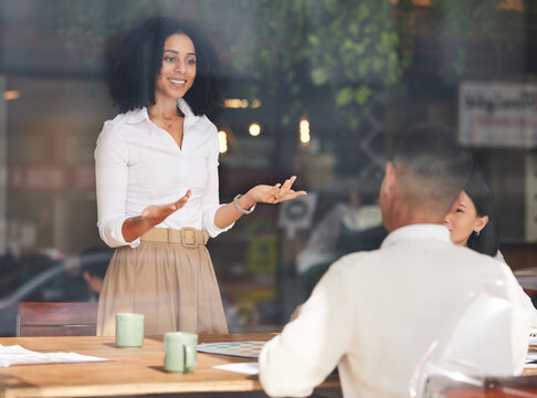 Management, Meeting Or Presentation With A Business Black Woman Talking To Her Team Through An Office Window. Training, Coaching Or Agenda With A Female Employee Speaking To A Colleague Group At Work