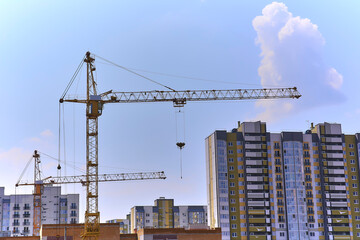 Fototapeta premium Panoramic view of construction sites and many cranes working