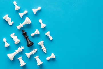 Chess pieces top view as business competition and leadership concept