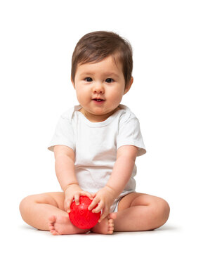 Cute baby in white onesie with red ball on transparent background