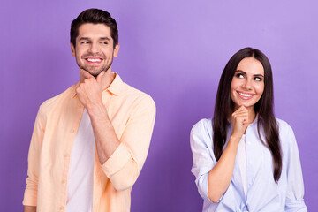 Photo of pretty dreamy married couple wear shirts arms chins looking empty space isolated violet...