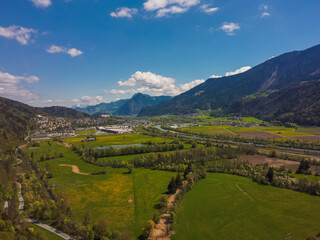 Obraz premium Aerial view Tratzberg castle in Stans, Tirol. Austria by drone. Alps mountains. River Inn.