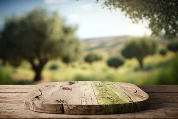 Deurstickers wooden table for product display with bokeh background of a natural olive field © Mkorobsky