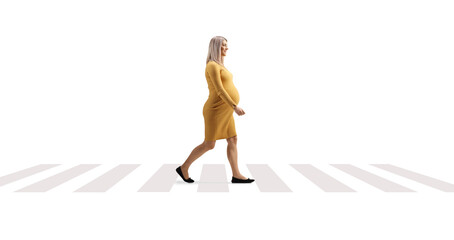 Pregnant walking on a pedestrian corssing