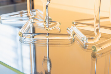 Abstract glass installation, transparent bent details