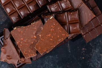 Chocolate bars on a dark background close-up