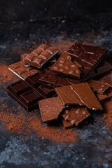 Chocolate bars on a dark background close-up