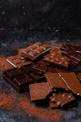 Chocolate bars on a dark background close-up