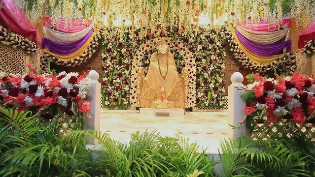 A view of the Sai Ram or Sai Baba idol amidst floral decoration
